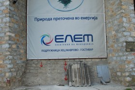 ELEM’s (Macedonian Energy Group) banner at the hydro power plant on Mavrovo Lake. It suggests that the hydropower plant would generate „green energy“. Photo Petr Hlobil.